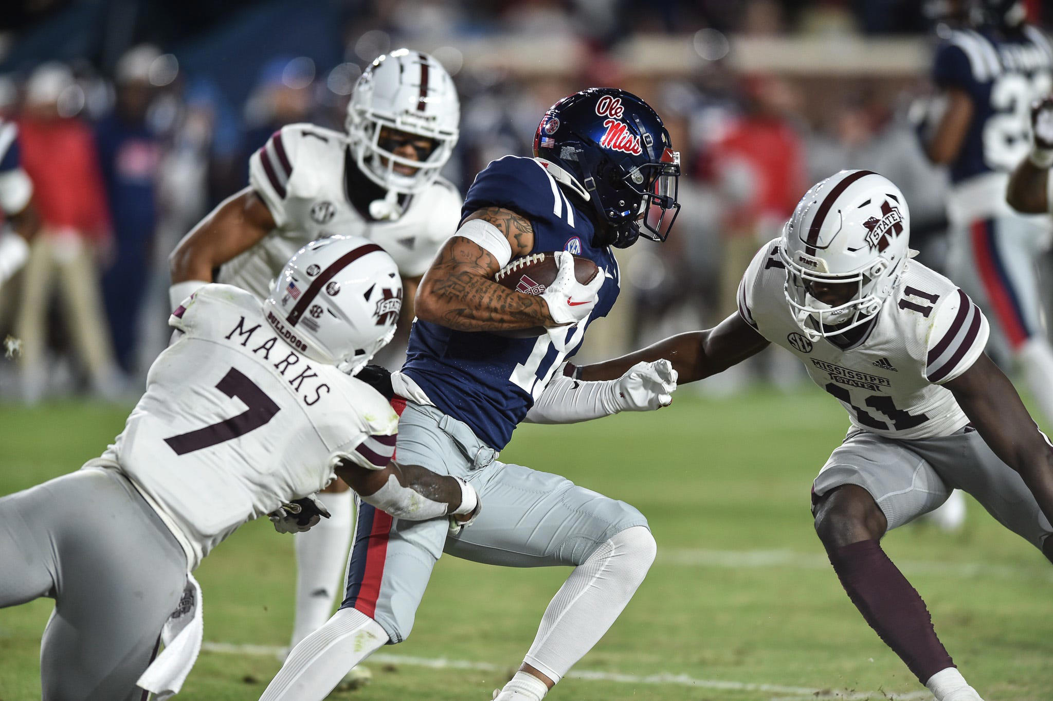 The iconic Egg Bowl trophy, symbolizing one of college football's fiercest rivalries between Ole Miss and Mississippi State.