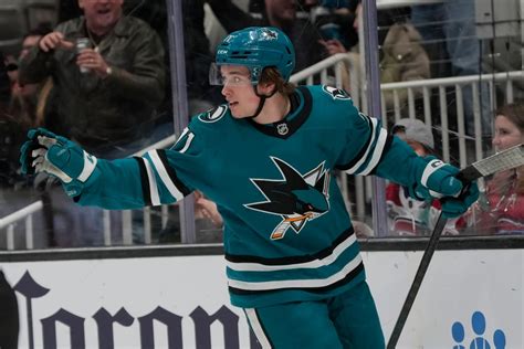 Sharks' rookie Celebrini celebrates his hat-trick against Utah.
