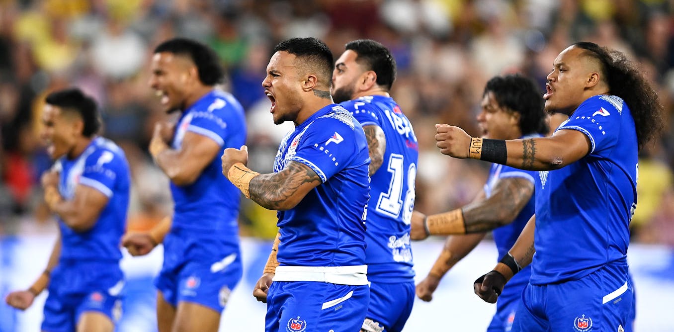Kiwis and Samoa players engage in a physical contest during their Pacific Championships group stage match.