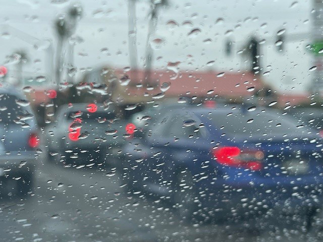 Drivers navigate wet streets during a morning commute in Las Vegas.