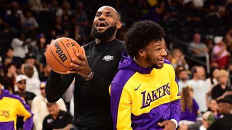 LeBron James and his son Bronny James on the court as Lakers teammates