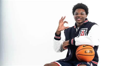 Bryce James playing college basketball for the University of Arizona