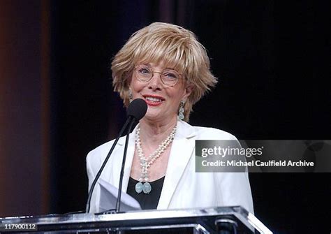 Stahl receiving a journalism award, highlighting her industry recognition