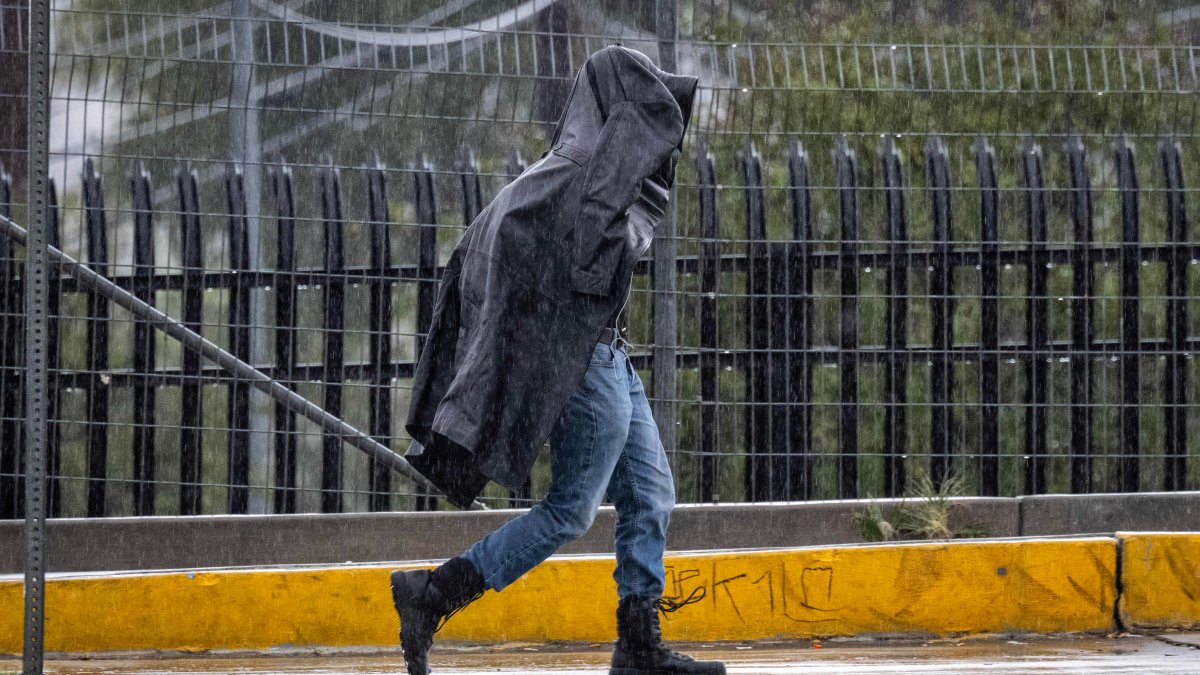 A flooded residential street in Westminster, Orange County, after heavy downpours.