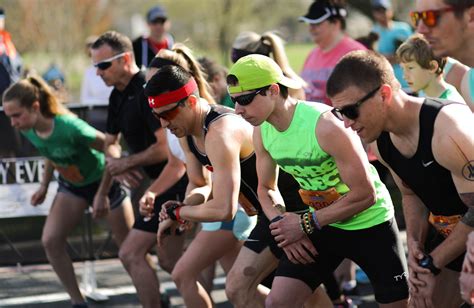 Runners tackle the picturesque Lake Monona stretch during the 2025 Madison Marathon.