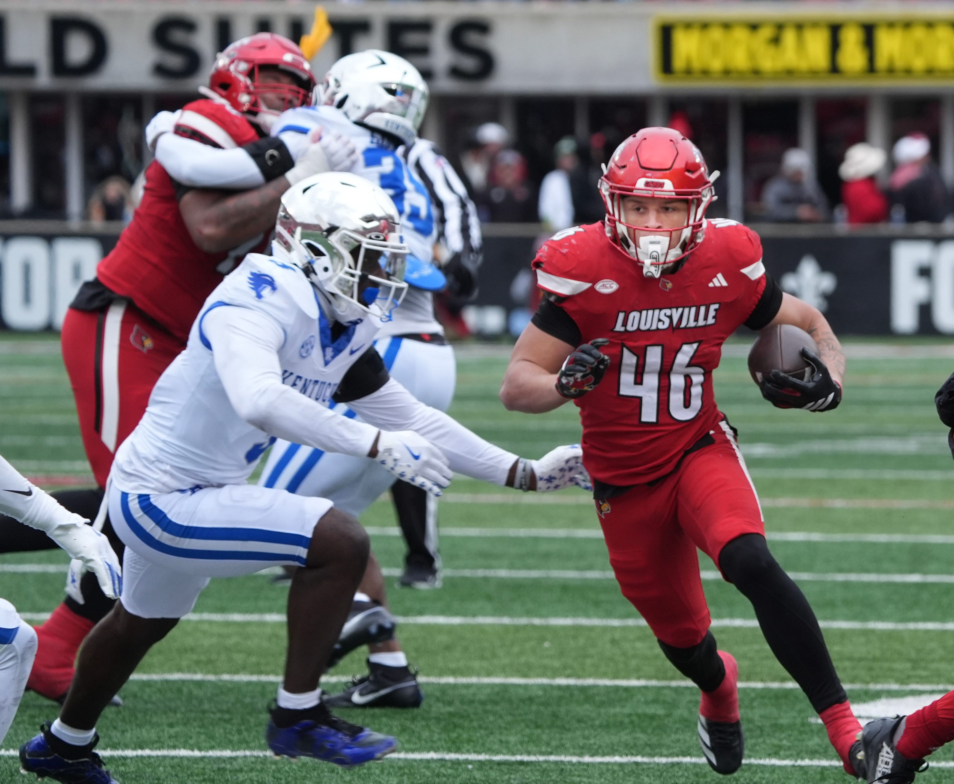 The intense handshake before the annual Kentucky-Louisville showdown