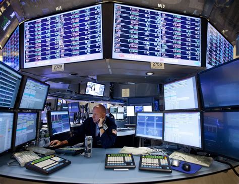 Traders react to market volatility following Nvidia's earnings report and economic data releases.