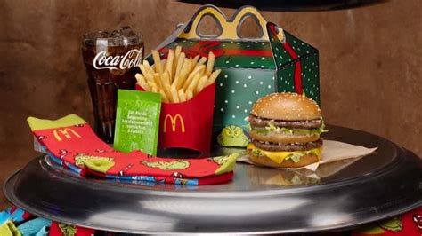 The complete Grinch Meal featuring a Big Mac, dill pickle fries, and festive socks.