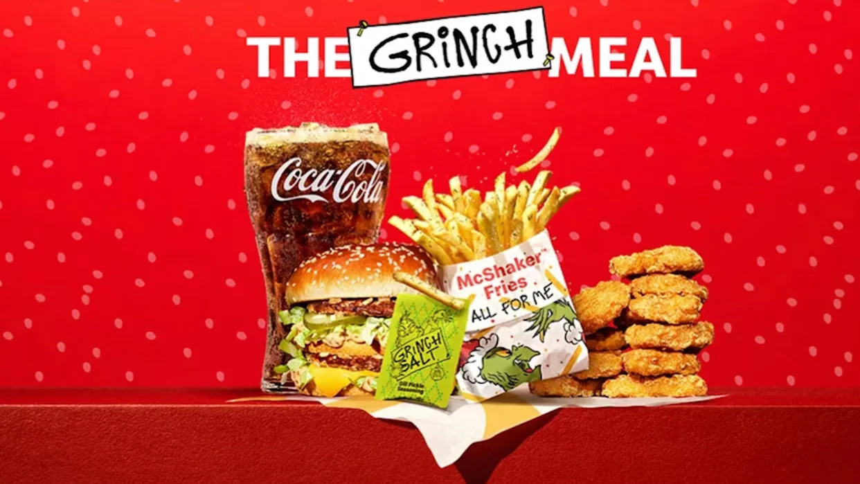 Customers shake the Dill Pickle seasoning onto fries in the McShaker bag.