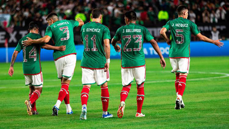 Thousands of fans fill the Alamodome to support the Mexican national team.