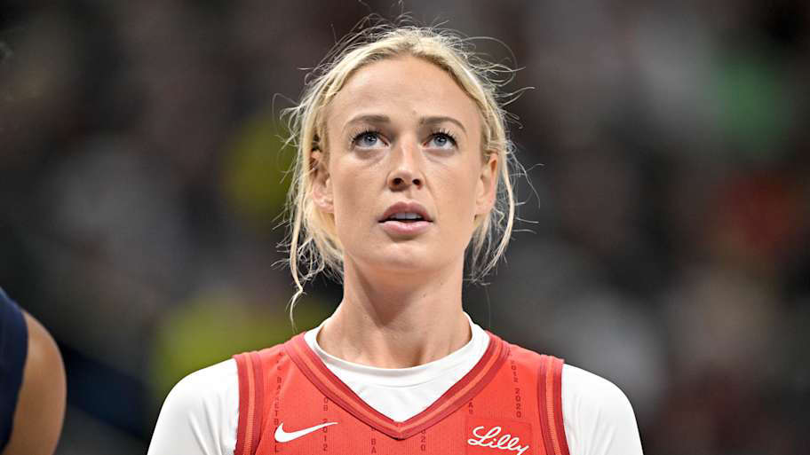 Porter and his girlfriend Sophie Cunningham supporting the Nets