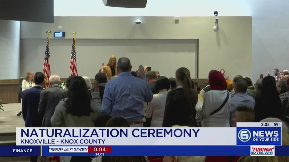 New U.S. citizens taking the Oath of Allegiance during a naturalization ceremony.