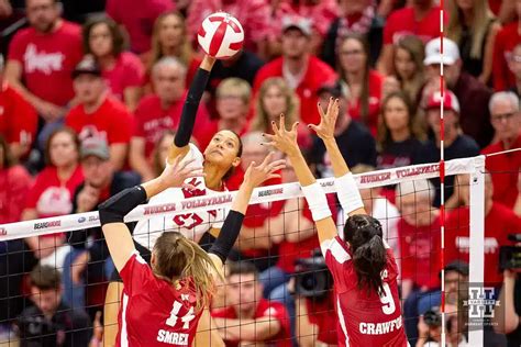 Harper Murray spikes the ball for the Huskers.