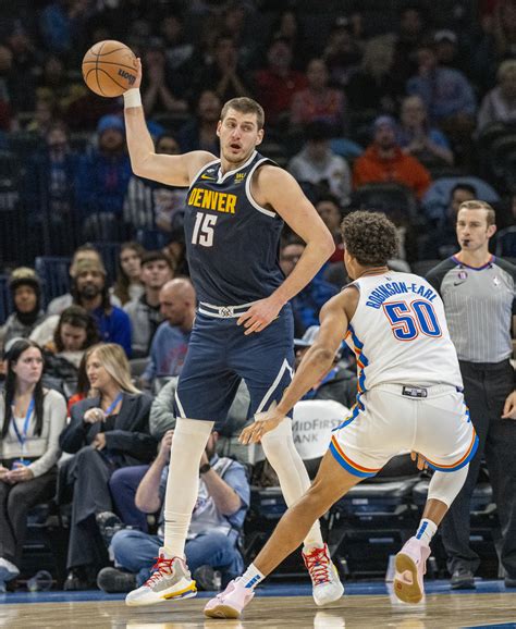 Jokic executing a signature post move showcasing his unique skill set