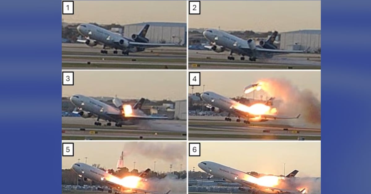 Microscopic view of fatigue cracks found in engine mounting lug after UPS crash.