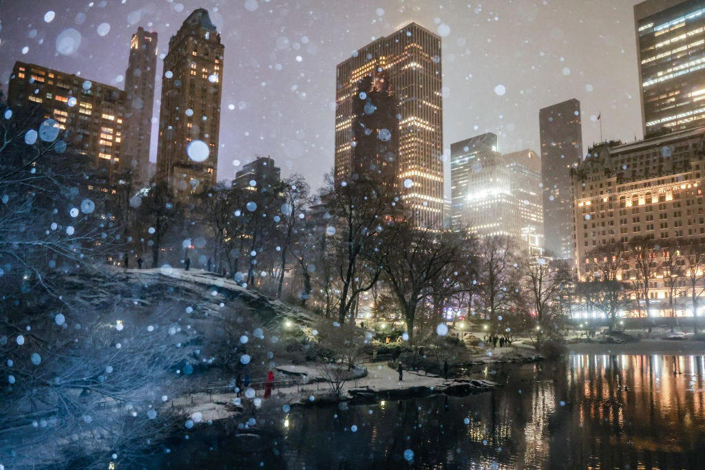 A snow-covered street in Manhattan during a winter storm.
