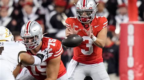 Lincoln Kienholz takes the field in place of Julian Sayin during a critical fourth-down situation.