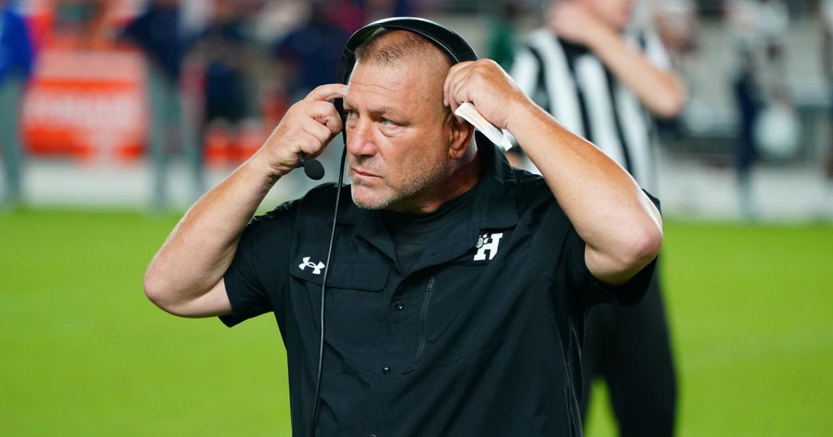 Sam Houston's Tim Burns Jr. celebrates after returning a kickoff for a touchdown in the second half.