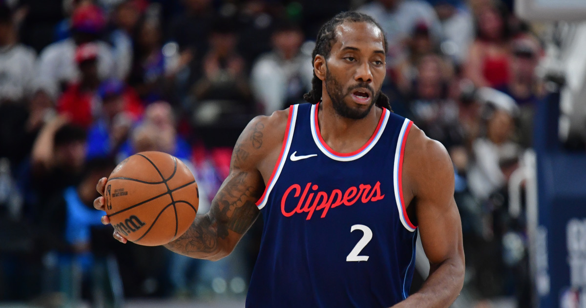 Paul George shares a moment with former teammate Kawhi Leonard after the game.