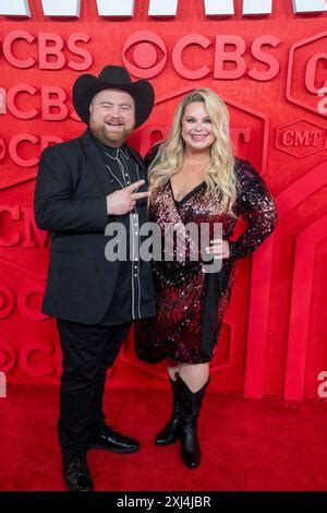 Hauser with his wife, who remains concerned about his wrestling risks.