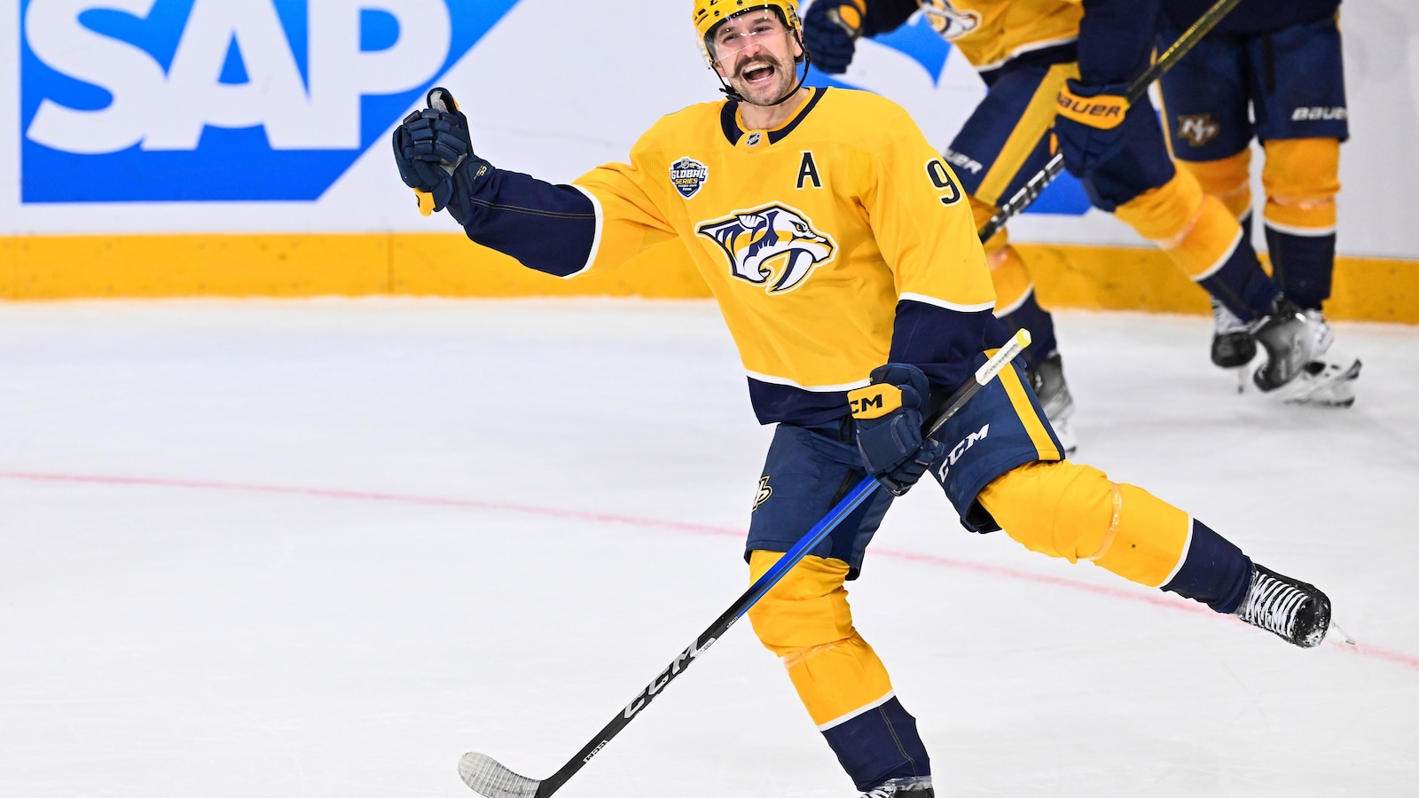 Steven Stamkos celebrates his overtime winner in Game 1 of the Global Series.