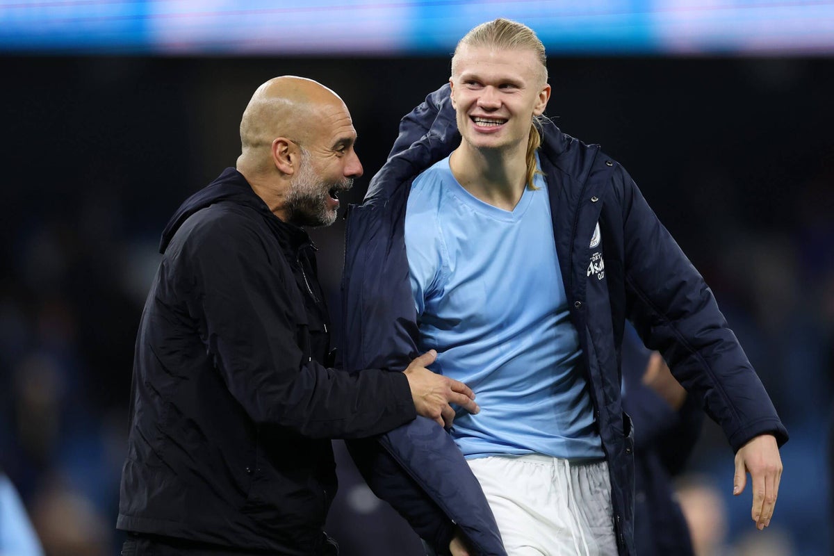 The electric atmosphere as City and Liverpool fans create a tense rivalry backdrop