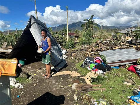 Residents prepare their homes for Super Typhoon Uwan's arrival.