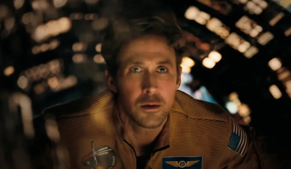 Ryan Gosling as Ryland Grace in his spaceship quarters, recording mission logs.