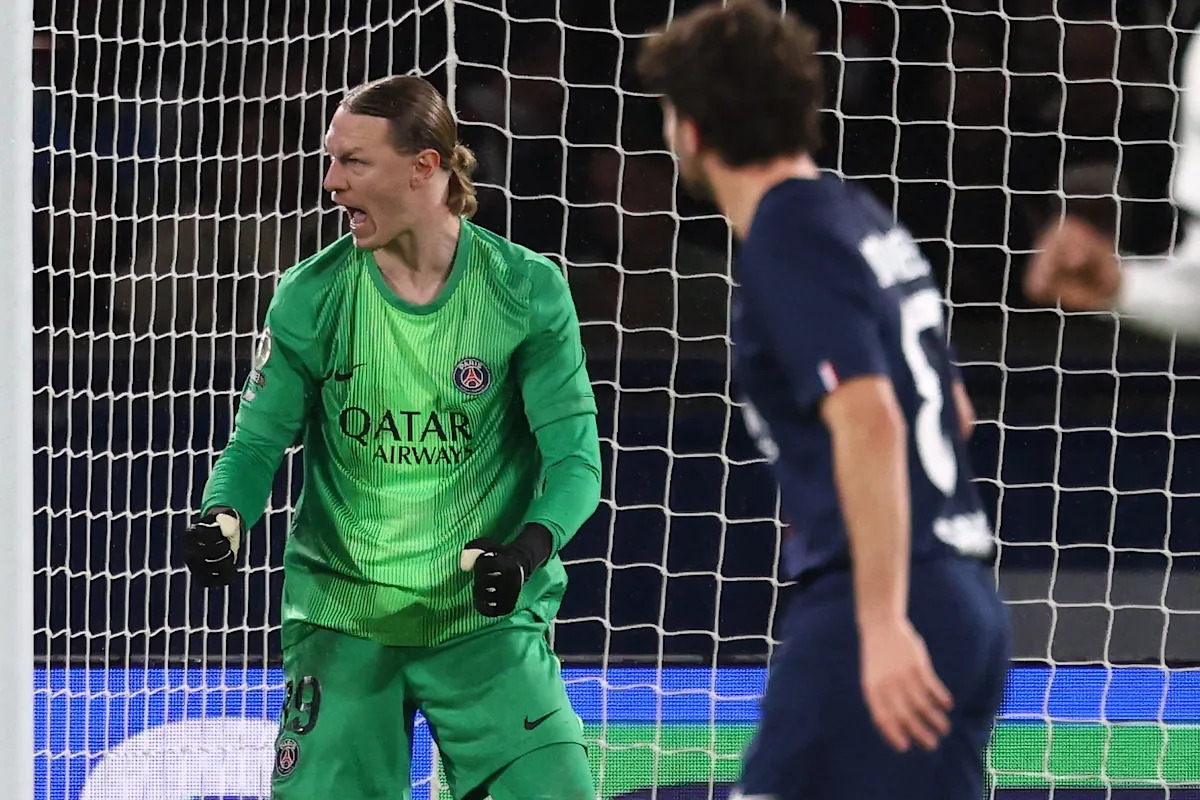 Matvei Safonov in action during the pre-match warm-up.