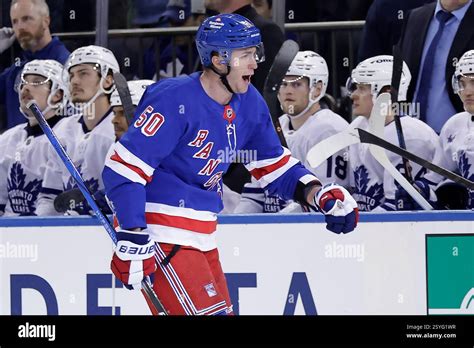 Rangers' power forward Will Cuylle battles in front of the net, a key weapon against Colorado's defense.