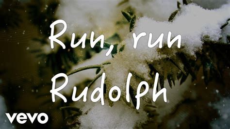 Official artwork for Reba McEntire's new holiday single 'Run Run Rudolph'.