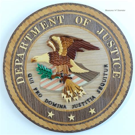 Symbol of the federal justice system handling the indictment.