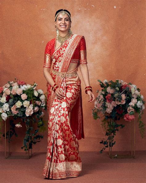 Samantha looking ethereal in her red silk saree and traditional gold jewelry.