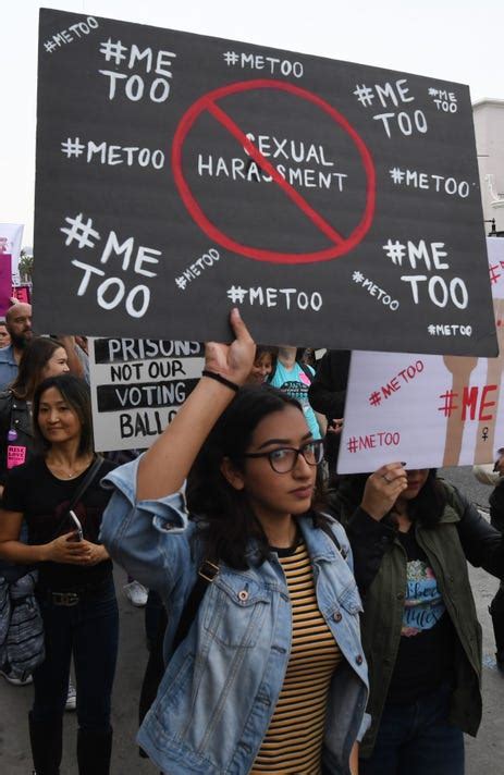 Activists participate in a #MeToo rally outside a major studio.