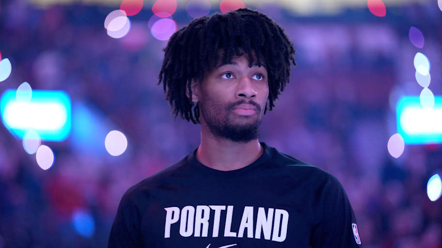 Shaedon Sharpe finishing at the rim with explosive athleticism.