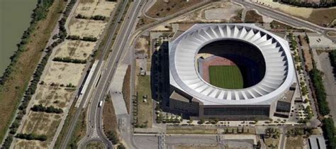 Spain players warm up under the lights before the crucial qualifier.