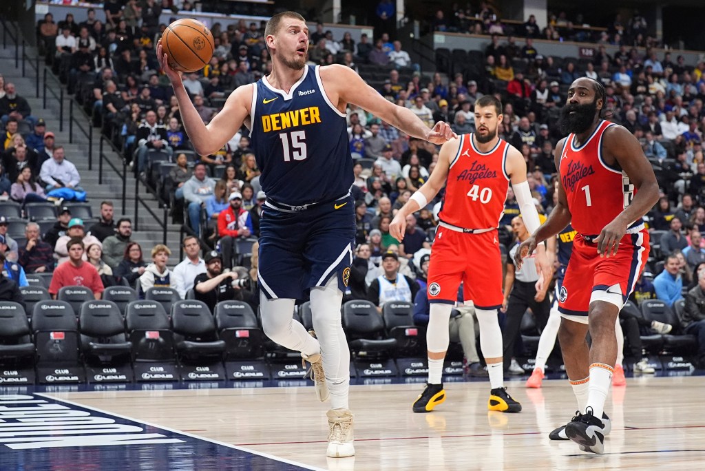Nikola Jokic orchestrates the Nuggets' offense in a crucial NBA Cup game.