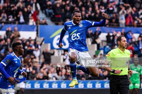 Strasbourg striker Habib Diallo celebrating after finding the net