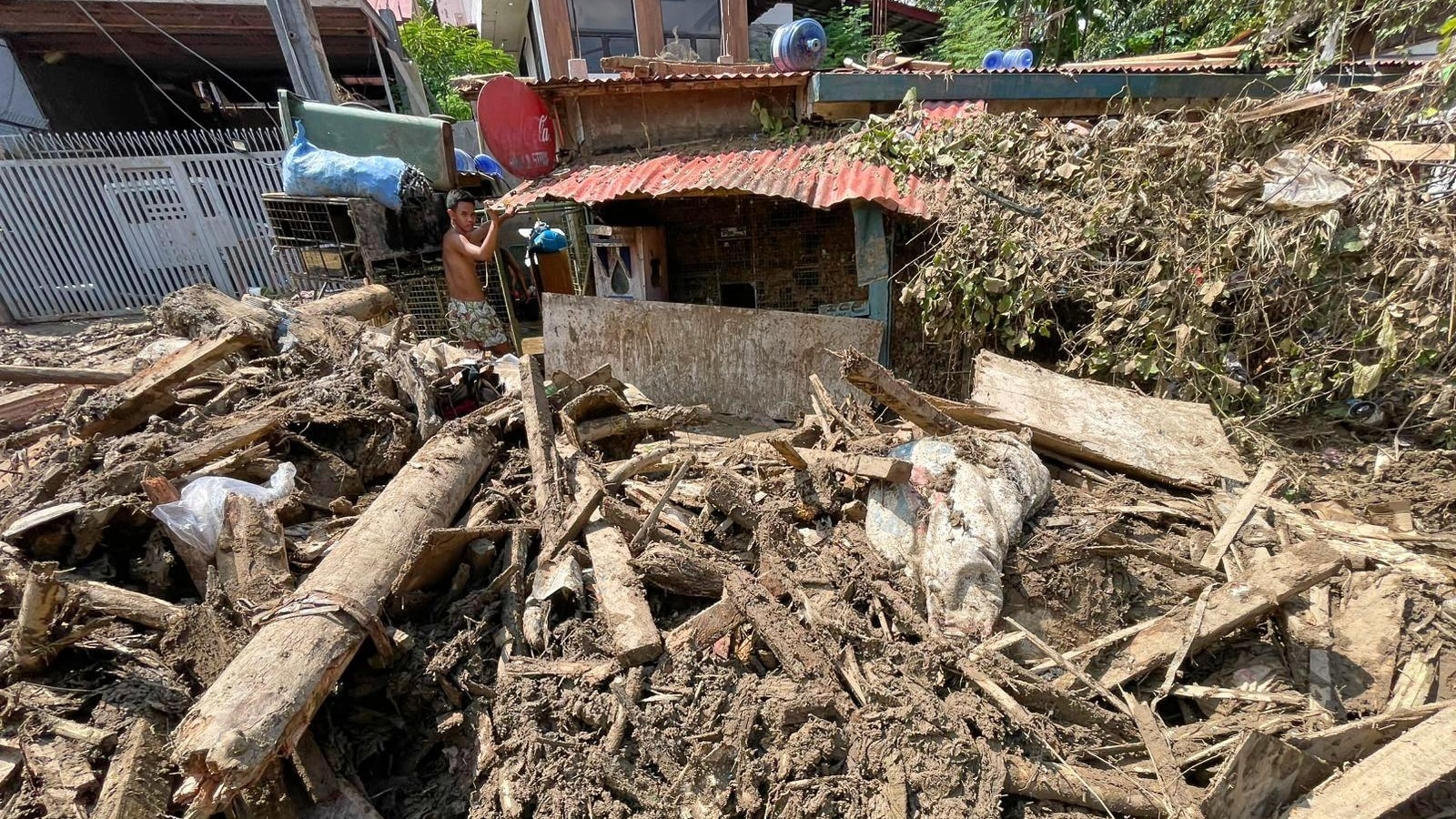 Residents take shelter in an evacuation center as Super Typhoon Uwan approaches.