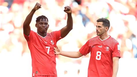 Breel Embolo celebrates one of his two goals against Sweden.