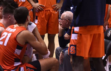 Syracuse players strategize during their overtime battle against Houston
