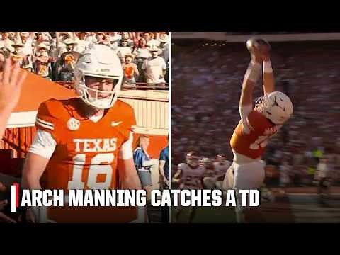 Arch Manning celebrates his first career receiving touchdown against Arkansas.