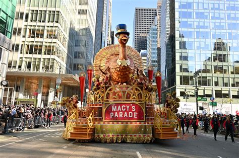 The iconic Macy's Thanksgiving Day Parade with giant floats and balloons in New York City.