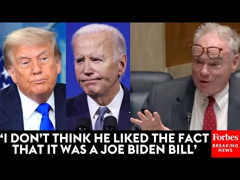 Senator Kaine advocating for federal infrastructure investment at a 2022 bill signing.