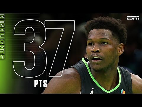 Anthony Edwards drives to the basket during a Timberwolves game.