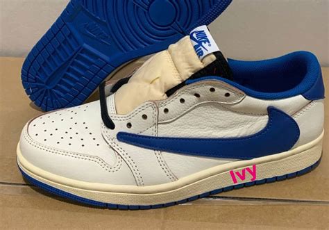 Detailed view of the Fragment x Travis Scott Air Jordan 1 Low showing the signature reverse Swoosh in Fragment blue.