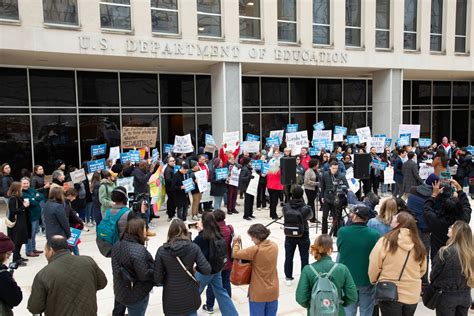 Activists demonstrate against the dismantling of federal education programs.