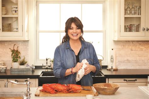 Bertinelli preparing fresh ingredients on her Food Network show.