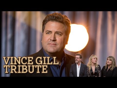 Vince Gill and Willie Nelson sharing the stage during their Lifetime Achievement Award presentation.