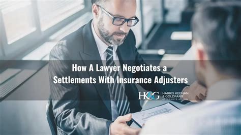 A personal injury attorney in a negotiation meeting with an insurance adjuster to discuss a settlement.